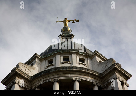 Statue of Lady Justice by British sculptor F W Pomeroy sits on top of the dome Of the Old Bailey court London England Stock Photo