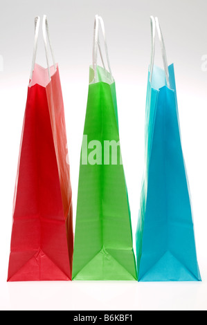 Three colourful paper shopping bags Stock Photo