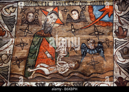 very old naive religious paintings in barsana old wooden church, maramures, romania Stock Photo