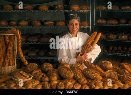 female baker art science food occupation culinary small business Stock Photo