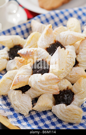 Finnish star shaped christmas puff pastries joulutorttu with dried plum marmalade Stock Photo