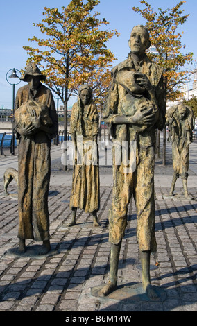 Famine sculptures by Rowan Gillespie, commemorating the victims of the Irish potato famine, on Custom House Quay, Dublin. Stock Photo