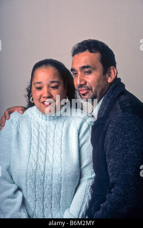 Hispanic couple look concerned. Stock Photo