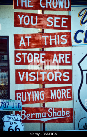 An old copied sign from the Burma Shave campaign is hung up in front of a grocery store in Seligman, Arizona. Stock Photo