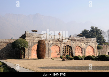 Nishat Bagh is the Mughal garden on the edge of Dal Lake and nearby mountains in Srinagar India Stock Photo