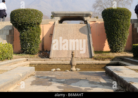 Nishat Bagh is the Mughal garden on the edge of Dal Lake and nearby mountains in Srinagar India Stock Photo