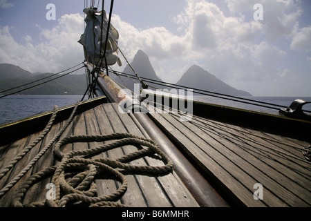 Bow of The Brig Unicorn with view of Pitons in St. Lucia Stock Photo