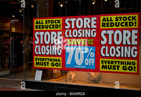 Shop window sale sign display store closing stock reduced, Scotland, UK, Europe Stock Photo