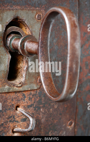 Keyhole in the old metal rusty chest Stock Photo