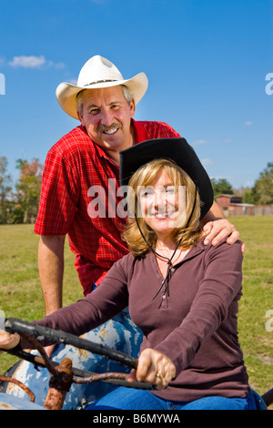Portrait of a beautiful mature couple on the farm Stock Photo