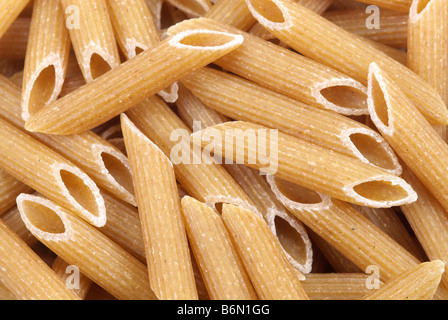 close up of whole wheat penne rigate pasta Stock Photo