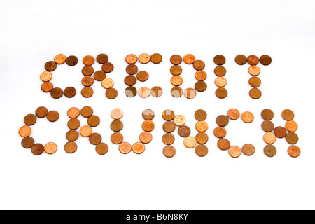 Concept of words 'Credit Crunch' spelled out in pennies on white background symbolizing lean times Stock Photo
