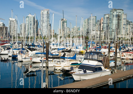 Boats in False Creek Marina, condos and skyscrapers in background, Vancouver, British Columbia, Canada Stock Photo