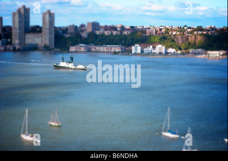 Hudson River Boats and ships in New York City, with New Jersey skyline in background Stock Photo