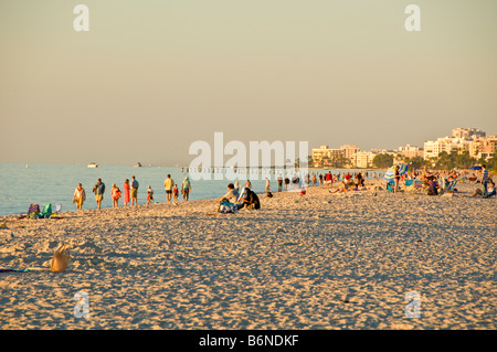 Naples Municipal Beach Naples Florida fl late afternoon sunbathers soft light white sand Stock Photo