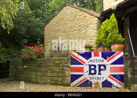 Old fashioned BP metal advert - Cotswold Motor Museum, Bourton-on-the-Water, Gloucestershire. Stock Photo
