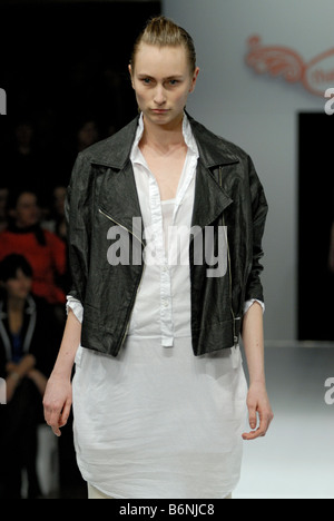 Female model wearing garments by Therese Rawsthorne at Melbourne Spring Fashion Week (MSFW), Out of the Shadows Stock Photo