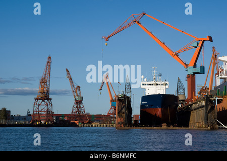 Cranes and floating dry dock in shipyard, Gothenburg, Sweden Stock Photo