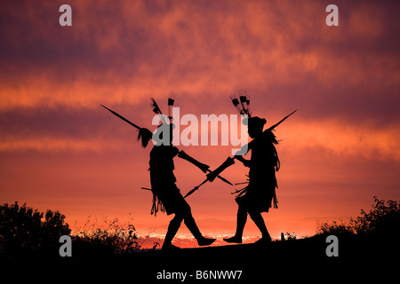 Warriors of the Angami tribe doing a tribal dance, Nagaland, India Stock Photo