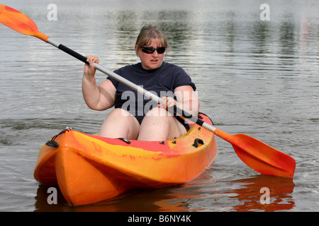 Mature woman enjoying her kayak Stock Photo