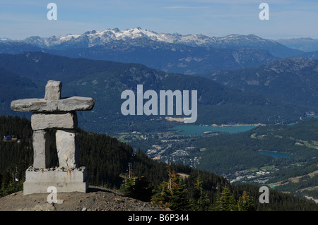 Inukshuk looking over Whistler Valley Stock Photo