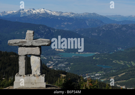 Inukshuk looking over Whistler Valley Stock Photo