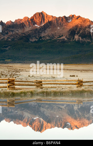 Sawtooth Mountains, near Stanley, Idaho, fall, reflection pond, fenceline Stock Photo