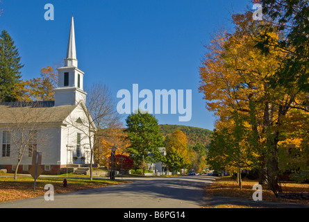 Autumn fall colours around traditional white timber clapperboard church Grafton Vermont USA United States of America Stock Photo