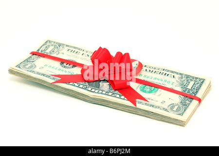 Stack of dollar banknotes with red ribbon isolated on white Stock Photo ...