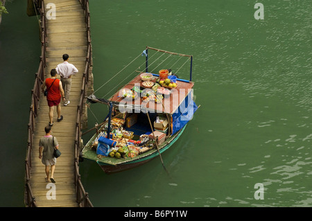 tourists on a boardwalk in Halong bay, Vietnam Stock Photo