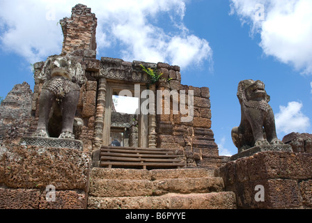 Entrance to ancient temple with lion guardians in the ancient capital town of Ayutthaya, Thailand Stock Photo