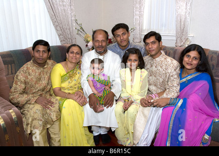 Bangladeshi American family at home in Brooklyn New York for the Muslim holiday of Eid, marking the end of Ramadan Stock Photo