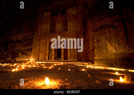 Romantic candle-lit view of Al Khazneh (Treasury) at Petra, one of the new wonders of the world, Jordan. Stock Photo