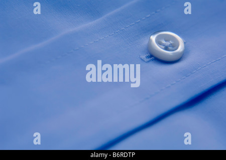 Button on blue Stock Photo
