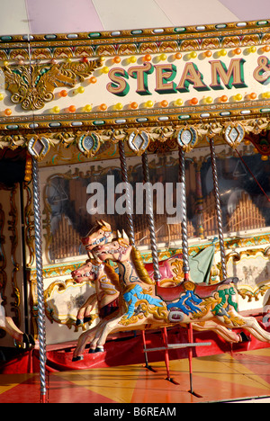 View of a historic carousel on Brighton sea front on a summers day UK Stock Photo