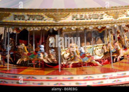 View of a historic carousel on Brighton sea front on a summers day UK Stock Photo