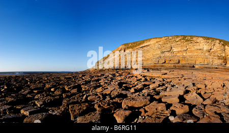 A panoramic view of the sandstone cliffs of Dunraven Bay in South Wales. Stock Photo