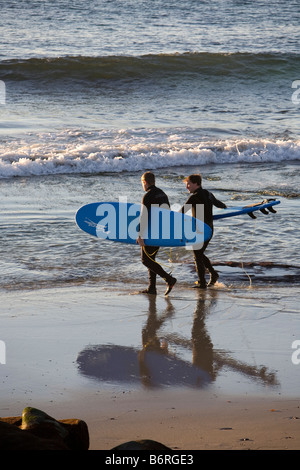Two men Getting Ready to go Surfing, Windansea Beach, La Jolla, California Stock Photo