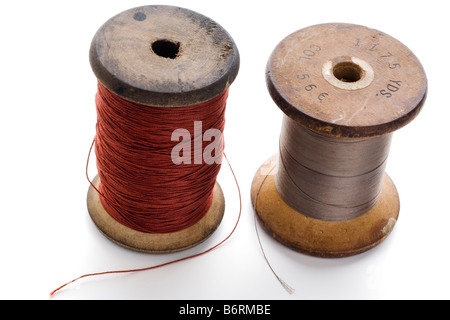 couple of spools of thread on white Stock Photo