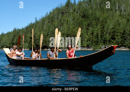 Native American Indians canoeing in a Traditional Dugout Canoe at the ...