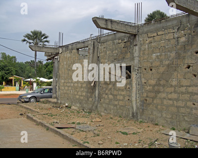 Unsafe work practice on a building site in The Gambia West Africa. Stock Photo