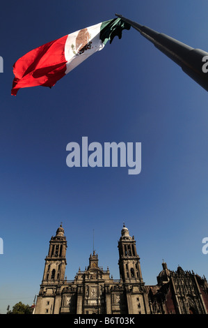 Mexican flag, Catedral Metropolitana on Zocalo, Mexico City Stock Photo