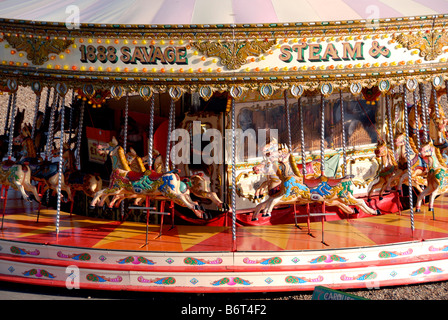 View of a historic carousel on Brighton sea front on a summers day UK Stock Photo