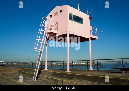 Pink lookout tower on Cardiff Bay barrage Severn Estuary, Wales UK waterfront landmark building Metal structure Welsh coastline British coast Stock Photo