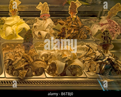 delivery device with different sorts of ice cream in an ice bar Stock Photo