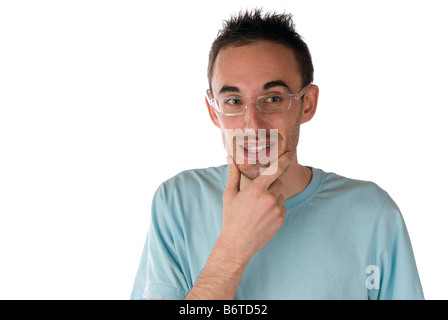 Young man with glasses stroking chin Stock Photo