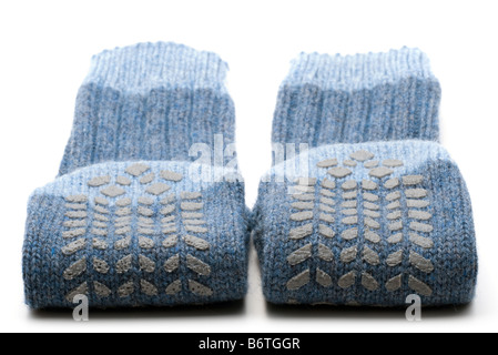 A pair of mens blue knitted slipper socks Stock Photo