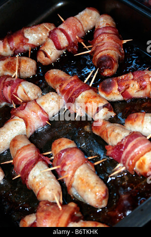 Wrapped Sausages with Bacon Stock Photo
