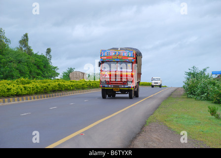 Truck and Jeep on Naitional highway, Pune, Maharashtra, India. Stock Photo