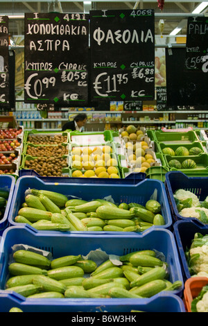 Foreign Supermarkets  Euro pricing of fruit and vegetables in Cyprus Supermarket Fresh foods produce Aisle, EU Europe. Stock Photo